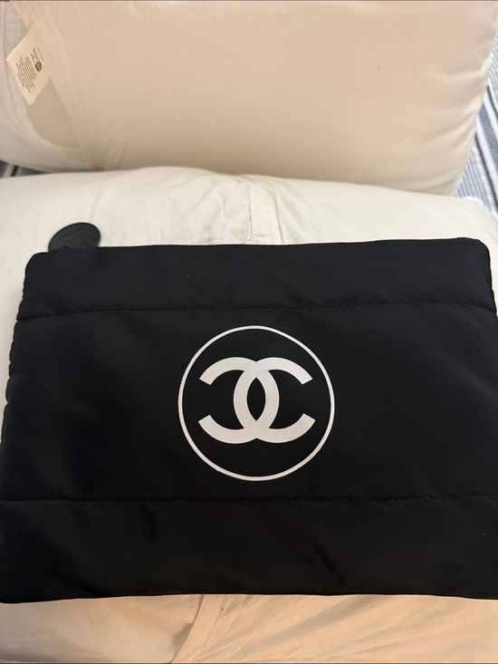 CHANEL Handbags - CHANEL Black Quilted Toiletry Pouch with White CC Logo
